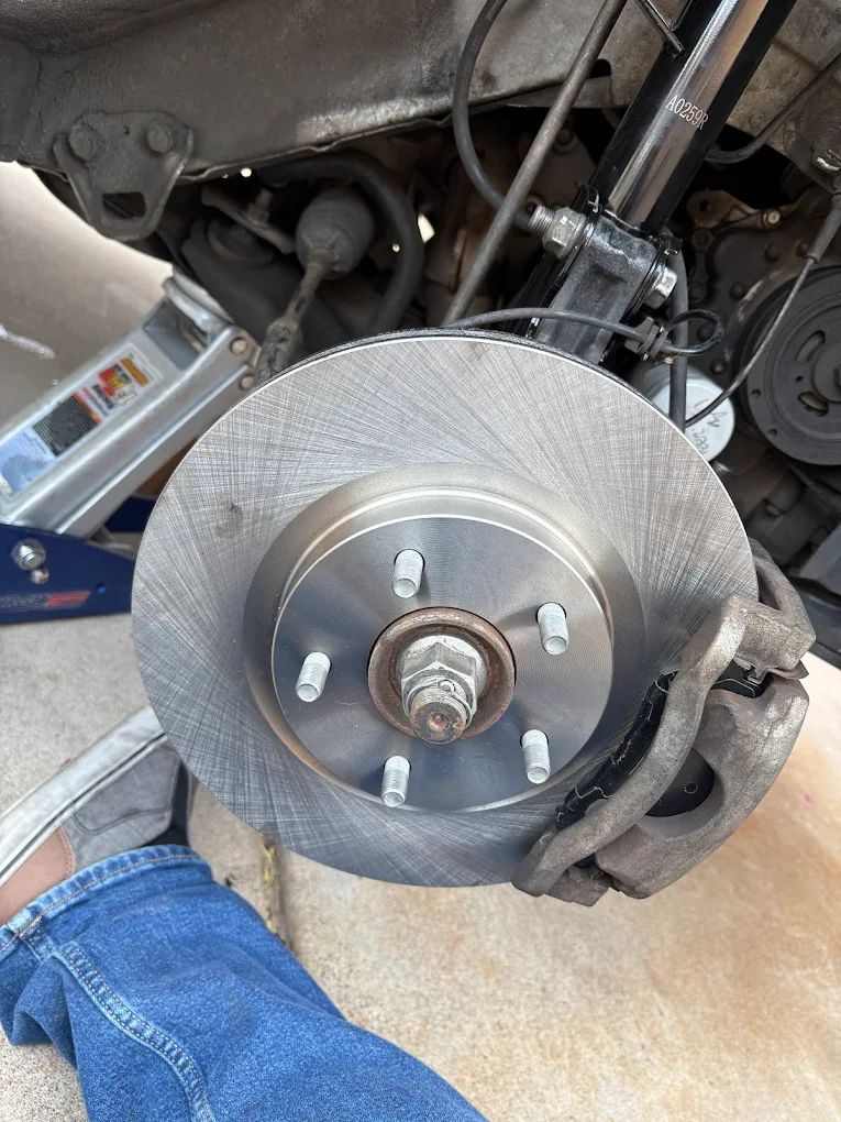 Brake replacement service with new rotor installed by AJ’s Mobile Auto Repair
